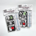 Clear and black spiderweb iPhone cases in Cosmic Valentine hang-tag packaging with blue wrist tethers