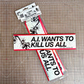 A.I. Wants to Kill Us All vinyl sticker, 12 × 3 in, on a cutting mat with packaged stickers
